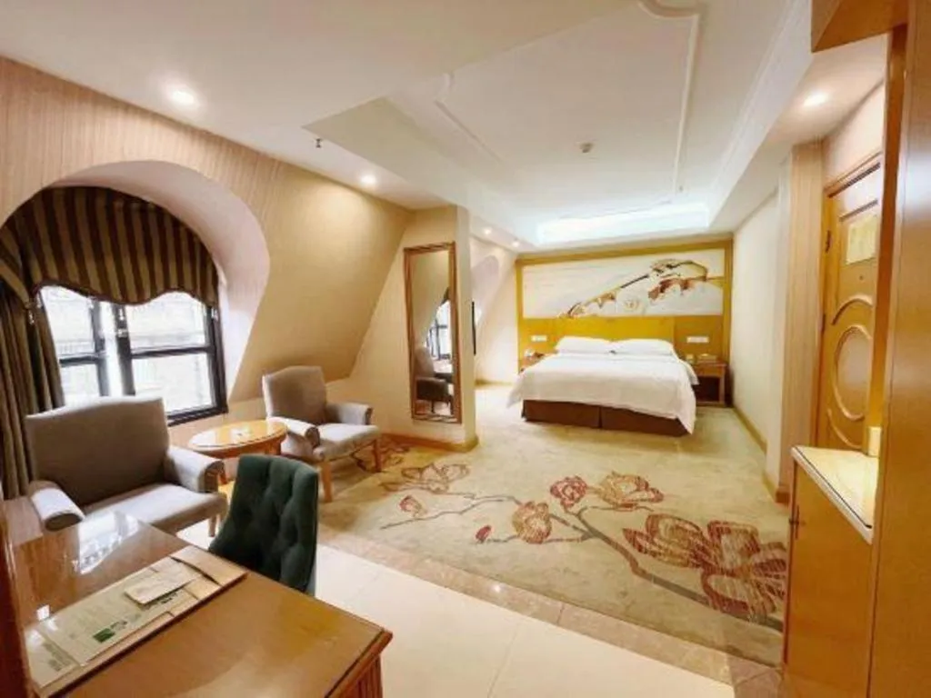 Bed in Vienna Hotel Chongqing Wanzhou Wanda Plaza