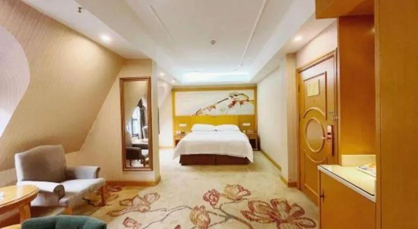 Bed in Vienna Hotel Chongqing Wanzhou Wanda Plaza