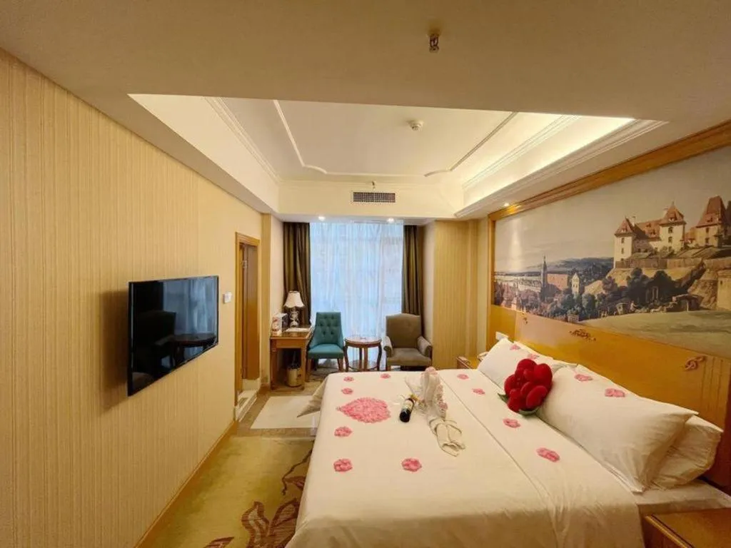 Bed in Vienna Hotel Chongqing Wanzhou Wanda Plaza