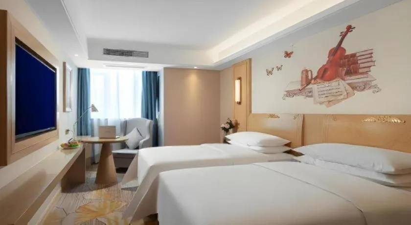 Bed in Vienna Hotel Chongqing Lijiatuo Pedestrian Street