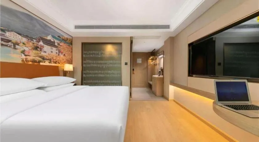 Bed in Vienna Hotel Hubei Jinzhou Changjiang University