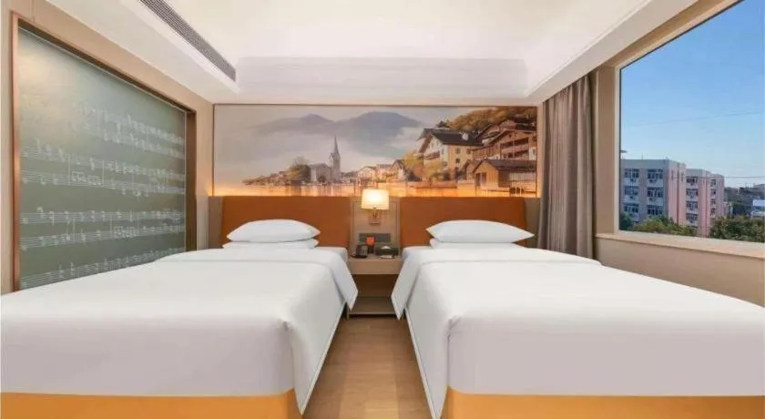 Bed in Vienna Hotel Hubei Jinzhou Changjiang University