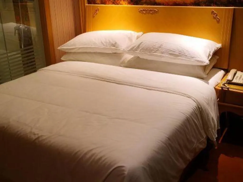 Bed in Vienna Hotel Anhui Jixi High-Speed Railway Station