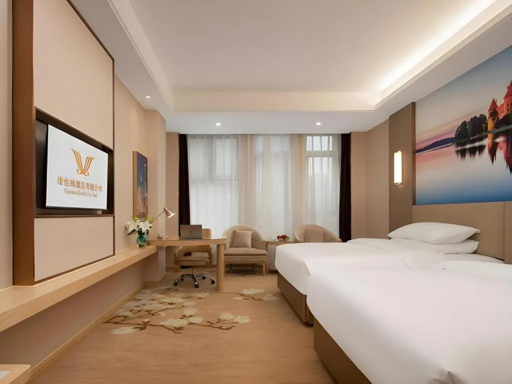 Bed in Vienna Hotel Chongqing Fengdu