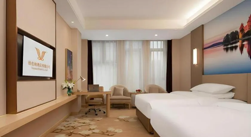 Bed in Vienna Hotel Chongqing Fengdu