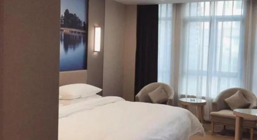 Bed in Vienna Hotel Chongqing Fengdu