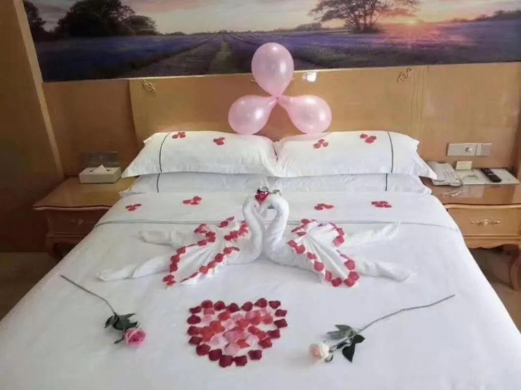 Bed in Vienna Hotel Chongqing Fengdu