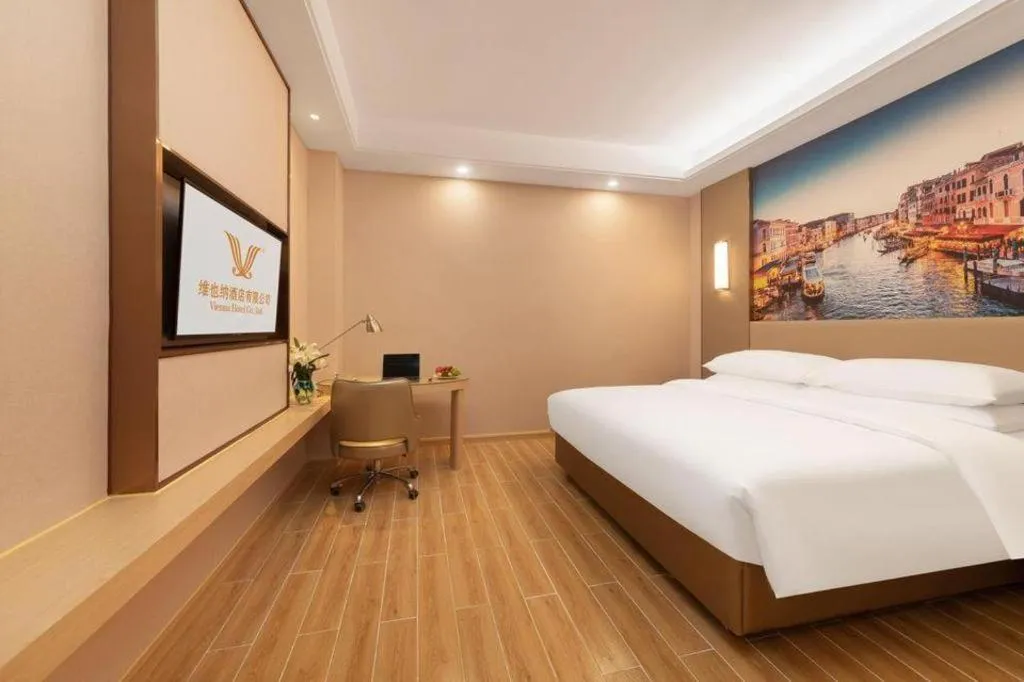 Bed in Vienna Hotel Chongqing Fengdu