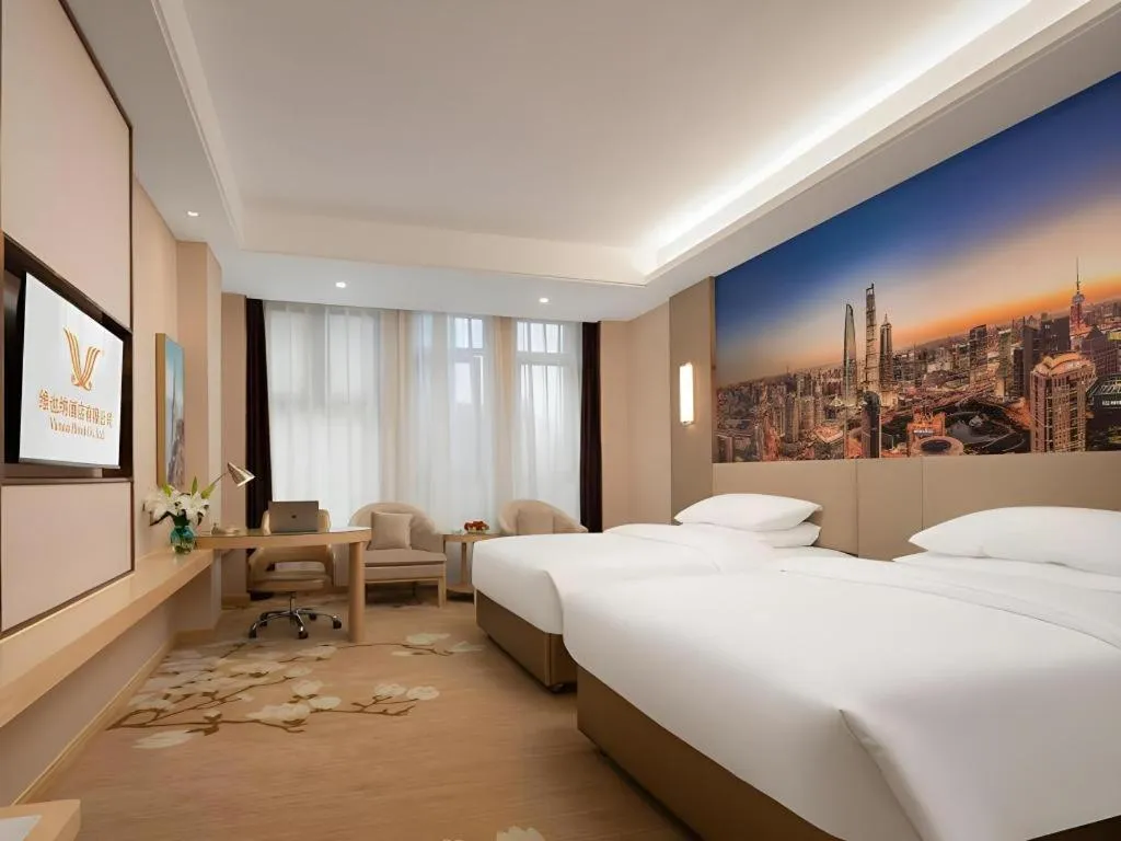 Bed in Vienna Hotel Chongqing Fengdu