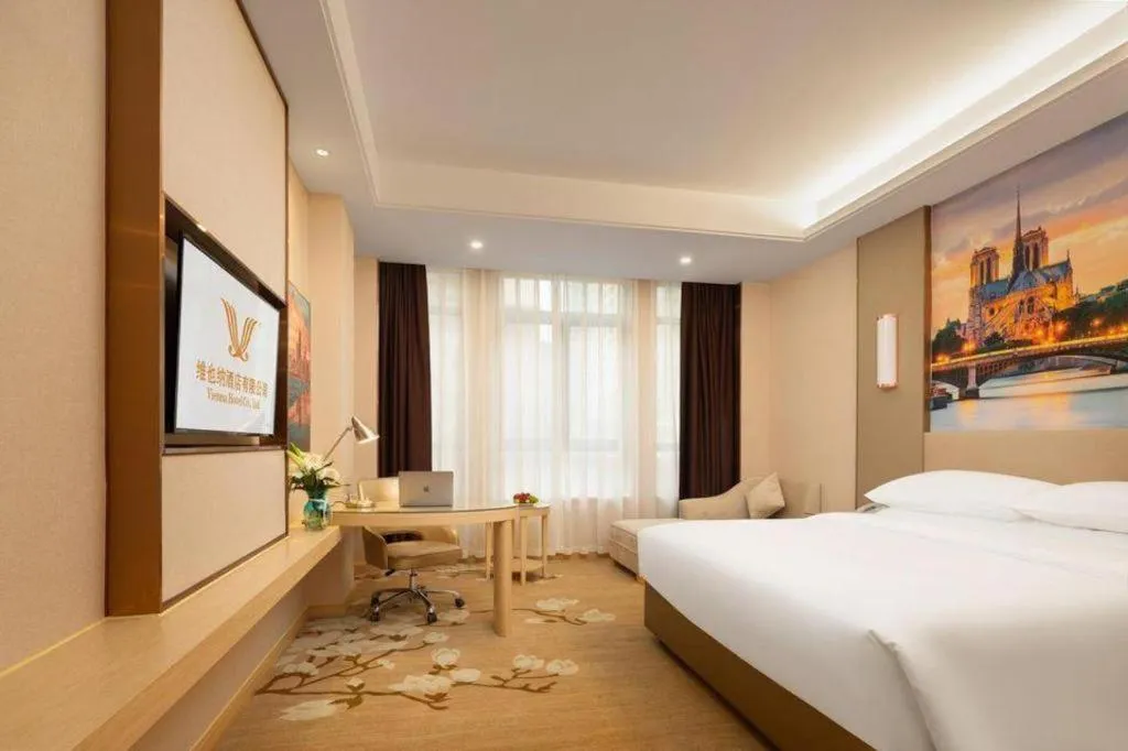 Bed in Vienna Hotel Chongqing Fengdu