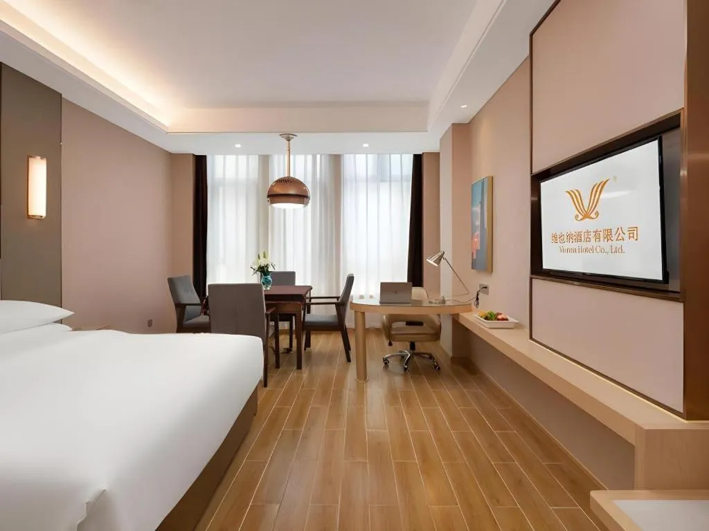 Bed in Vienna Hotel Chongqing Fengdu