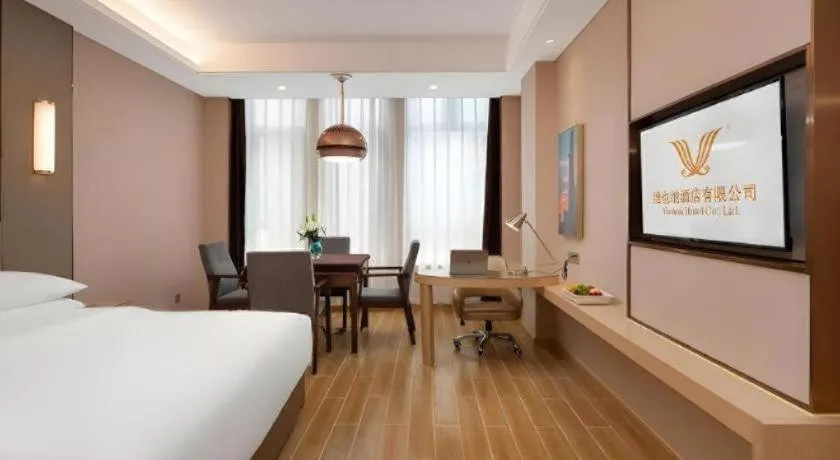 Bed in Vienna Hotel Chongqing Fengdu