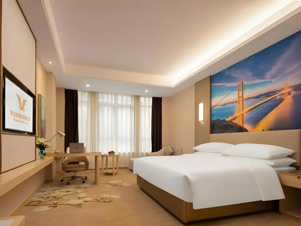 Bed in Vienna Hotel Chongqing Fengdu