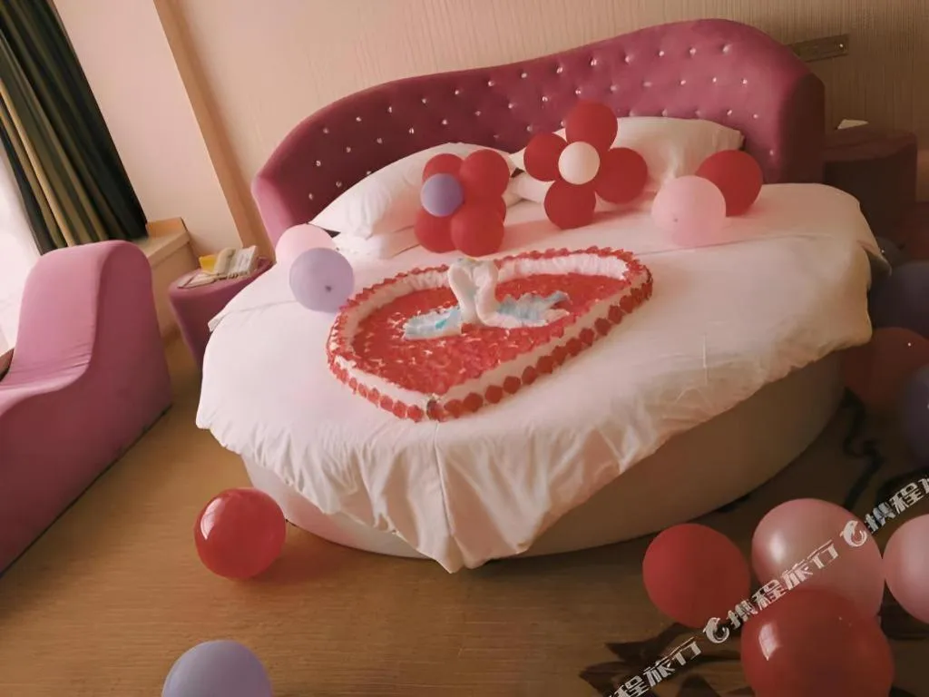 Bed in Vienna Hotel Guangxi Guilin Gongchengtianjie