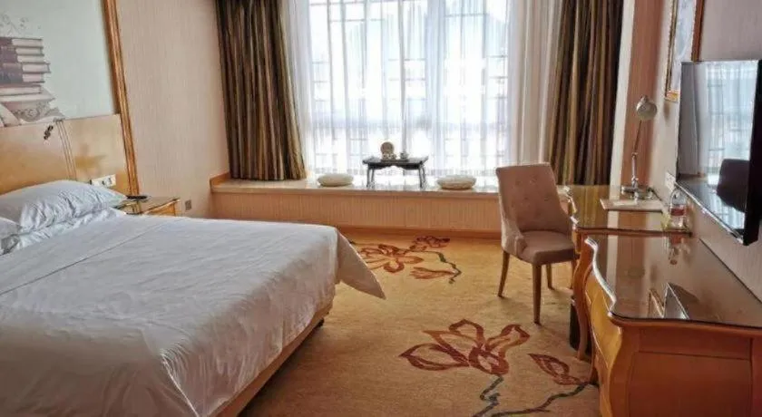 Bed in Vienna Hotel Guangxi Guilin Gongchengtianjie