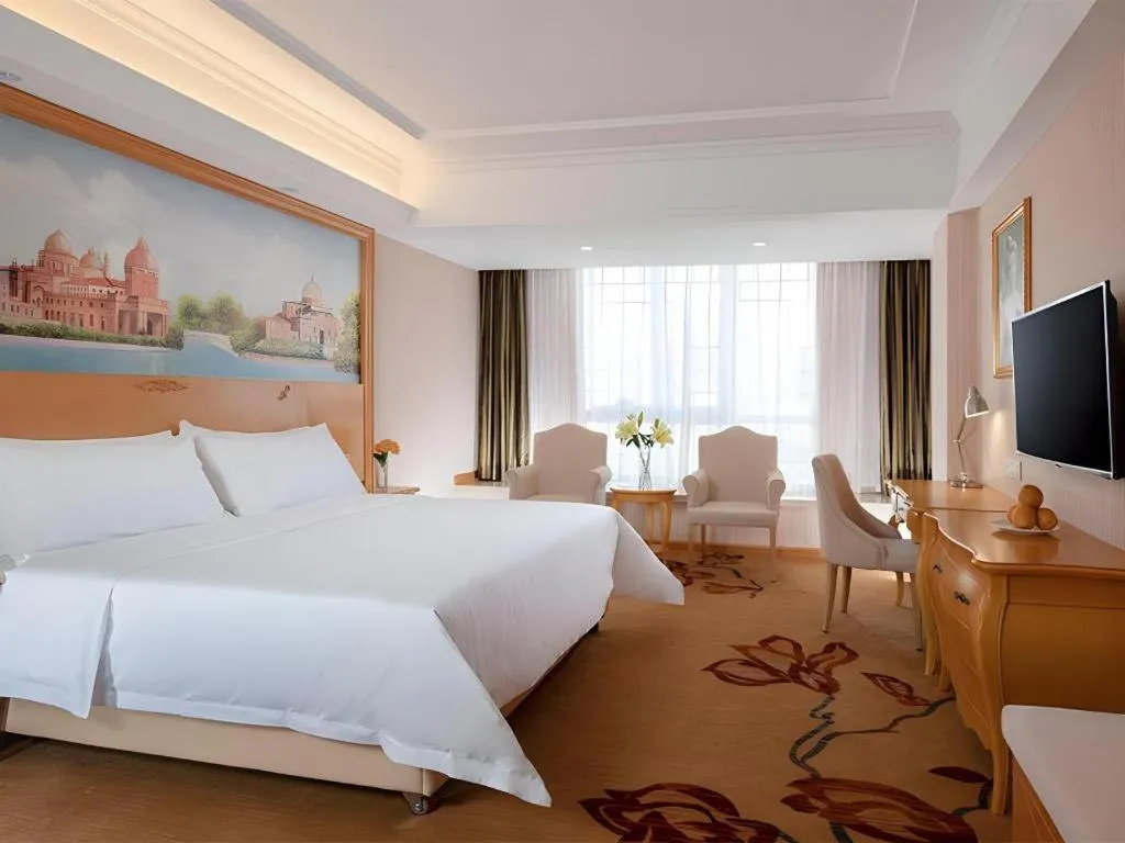 Bed in Vienna Hotel Guangxi Guilin Gongchengtianjie