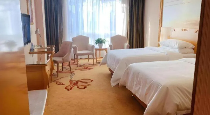 Bed in Vienna Hotel Guangxi Guilin Gongchengtianjie