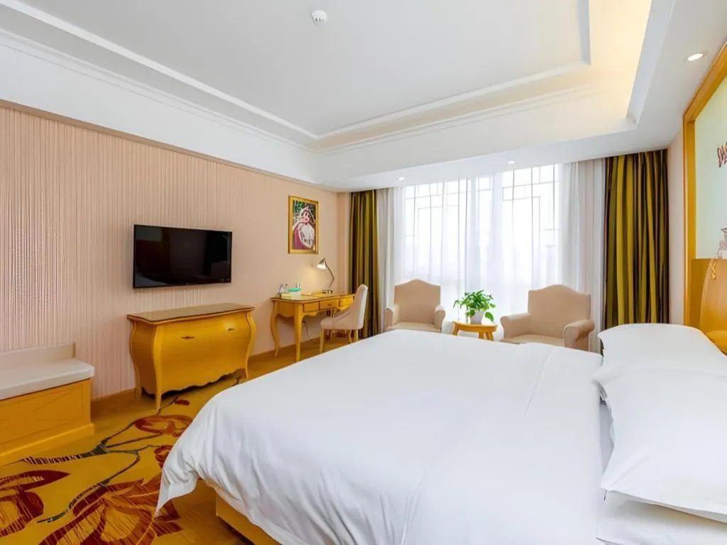 Bed in Vienna Hotel Guangxi Guilin Gongchengtianjie