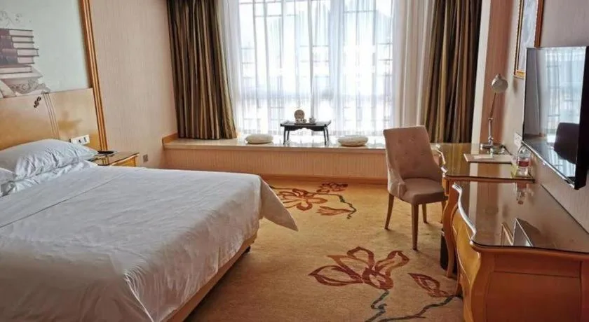 Bed in Vienna Hotel Guangxi Guilin Gongchengtianjie