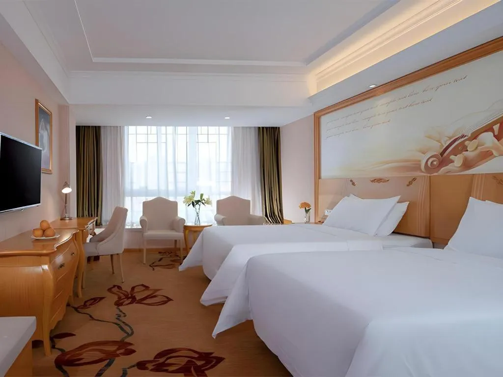 Bed in Vienna Hotel Guangxi Guilin Gongchengtianjie