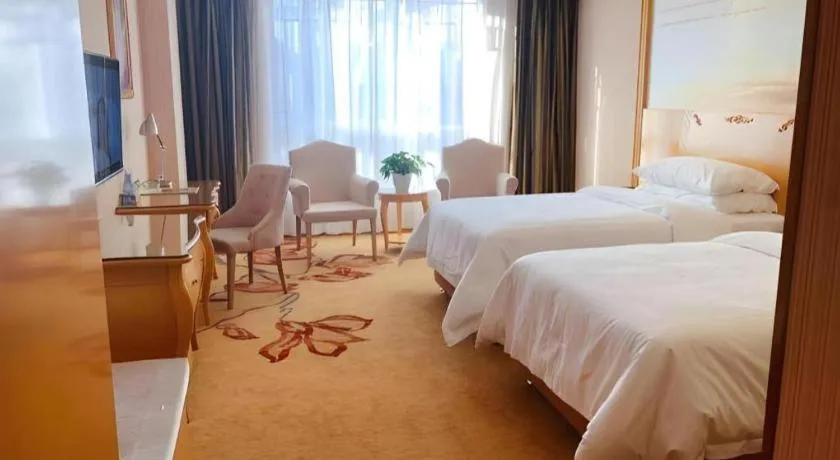 Bed in Vienna Hotel Guangxi Guilin Gongchengtianjie