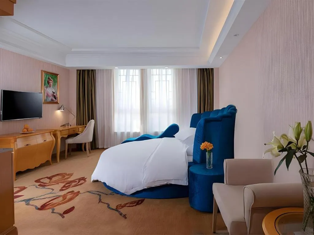 Bed in Vienna Hotel Guangxi Guilin Gongchengtianjie