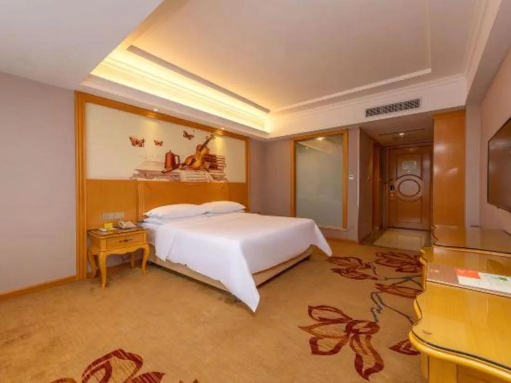 Bed in Vienna Hotel Guangxi Guilin Gongchengtianjie