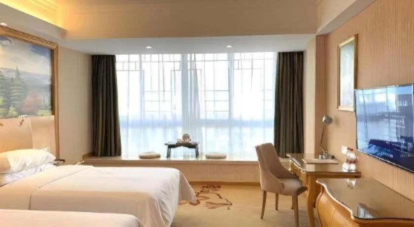 Bed in Vienna Hotel Guangxi Guilin Gongchengtianjie