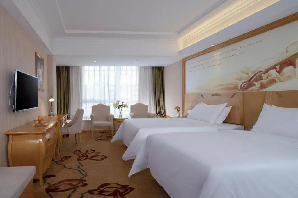 Bed in Vienna Hotel Guangxi Guilin Gongchengtianjie