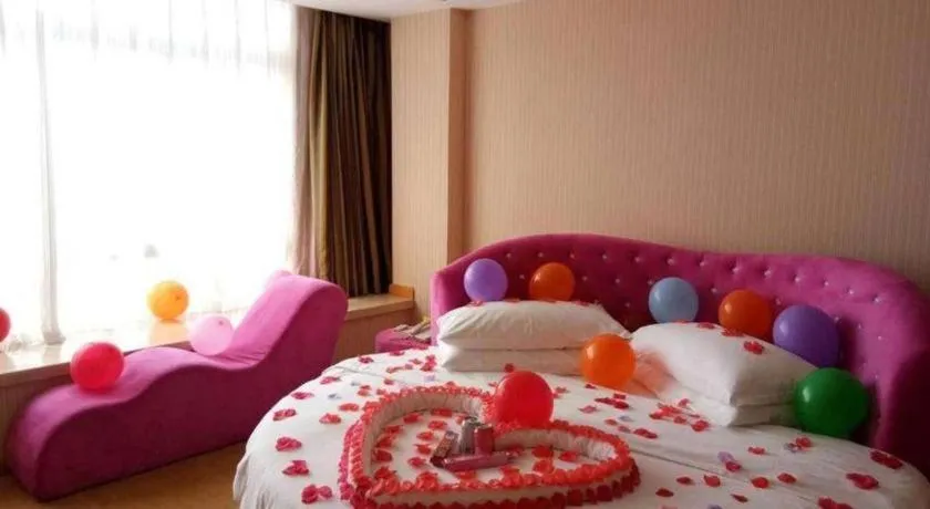 Bed in Vienna Hotel Guangxi Guilin Gongchengtianjie