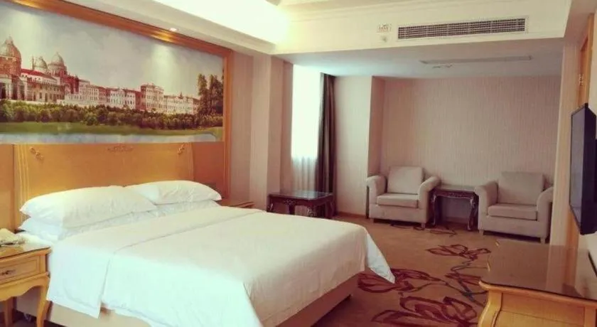 Bed in Vienna Hotel Guangxi Guilin Gongchengtianjie