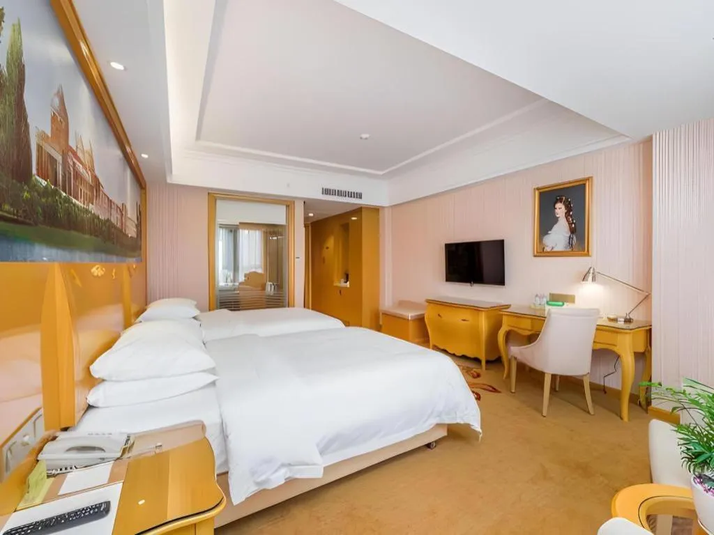 Bed in Vienna Hotel Guangxi Guilin Gongchengtianjie