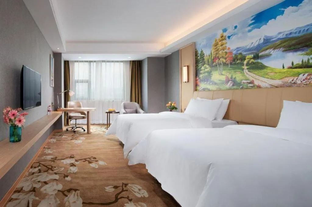 Bed in Vienna Hotel Jiangxi Ji'an Yanjingfu