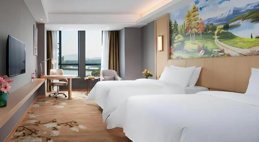 Bed in Vienna Hotel Jiangxi Ji'an Yanjingfu