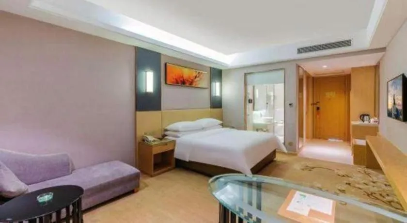 Bed in Vienna Hotel Guangdong Zhongshan Xiaolan High-Speed Railway Station