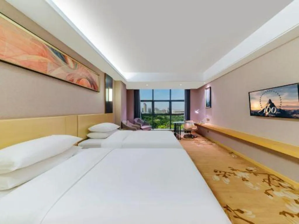Bed in Vienna Hotel Guangdong Zhongshan Xiaolan High-Speed Railway Station