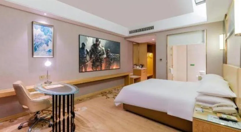Bed in Vienna Hotel Guangdong Zhongshan Xiaolan High-Speed Railway Station