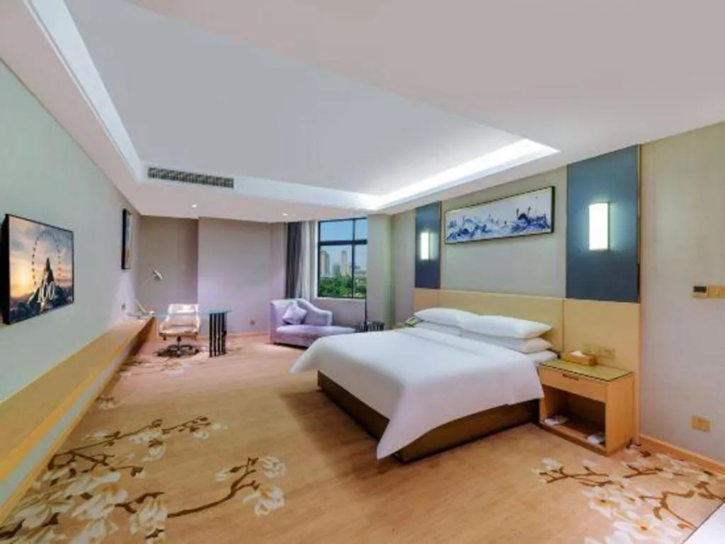 Bed in Vienna Hotel Guangdong Zhongshan Xiaolan High-Speed Railway Station