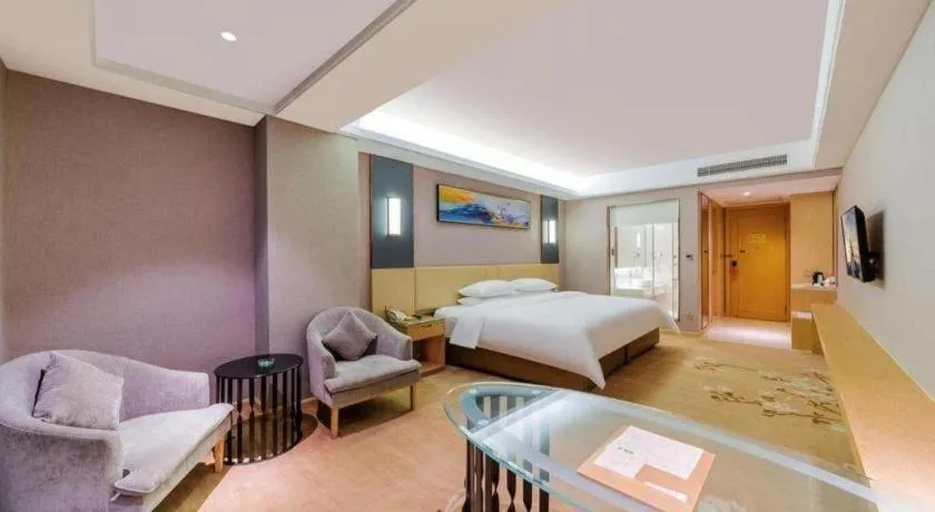 Bed in Vienna Hotel Guangdong Zhongshan Xiaolan High-Speed Railway Station
