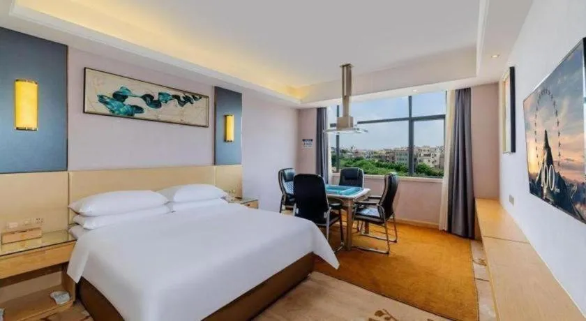 Bed in Vienna Hotel Guangdong Zhongshan Xiaolan High-Speed Railway Station