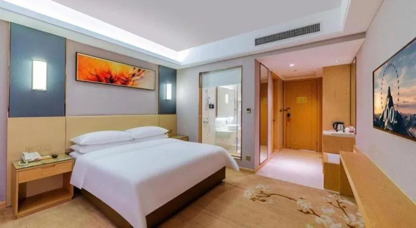 Bed in Vienna Hotel Guangdong Zhongshan Xiaolan High-Speed Railway Station