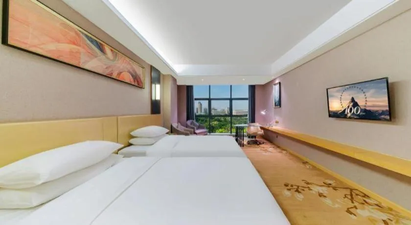 Bed in Vienna Hotel Guangdong Zhongshan Xiaolan High-Speed Railway Station
