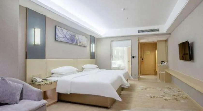 Bed in Vienna Hotel Guangdong Zhongshan Xiaolan High-Speed Railway Station