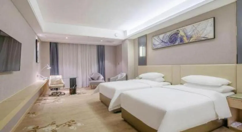 Bed in Vienna Hotel Guangdong Zhongshan Xiaolan High-Speed Railway Station