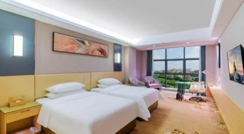 Bed in Vienna Hotel Guangdong Zhongshan Xiaolan High-Speed Railway Station