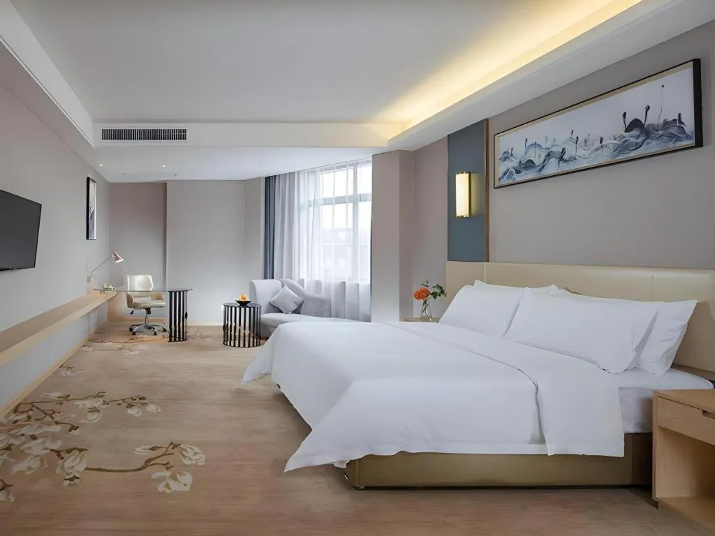 Bed in Vienna Hotel Guangdong Zhongshan Xiaolan High-Speed Railway Station