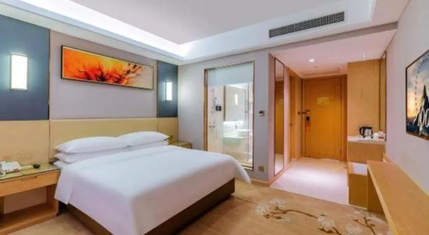 Bed in Vienna Hotel Guangdong Zhongshan Xiaolan High-Speed Railway Station