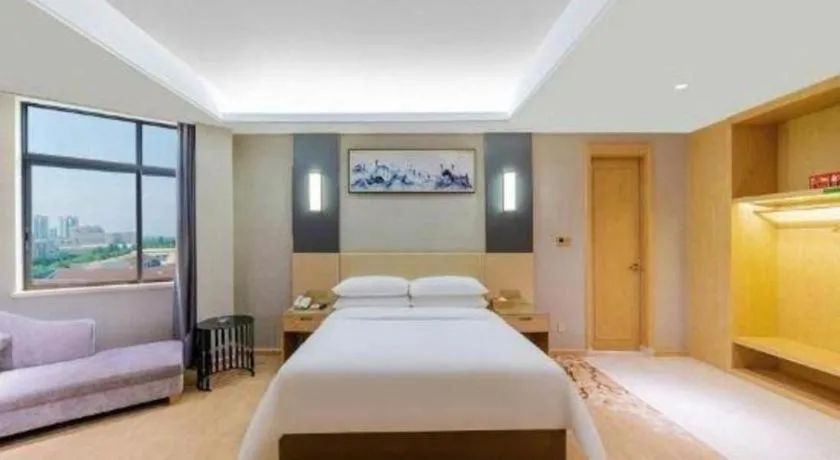 Bed in Vienna Hotel Guangdong Zhongshan Xiaolan High-Speed Railway Station
