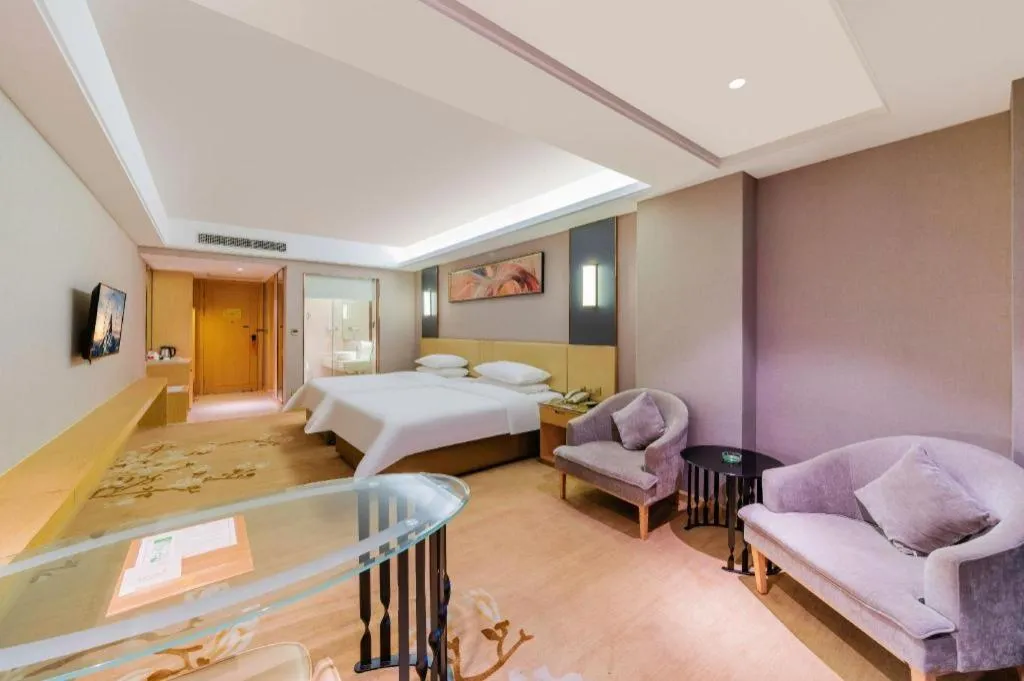 Bed in Vienna Hotel Guangdong Zhongshan Xiaolan High-Speed Railway Station