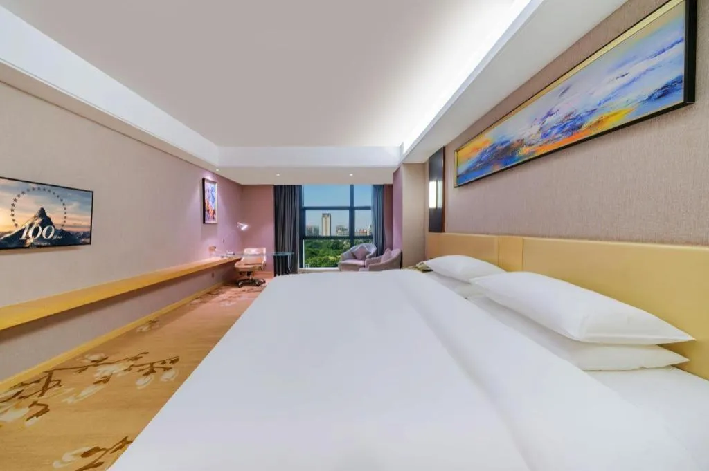 Bed in Vienna Hotel Guangdong Zhongshan Xiaolan High-Speed Railway Station